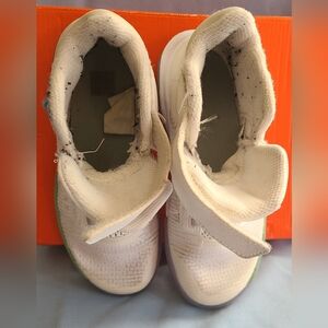 Nike Kids size 12. Color white with some grey and a hint of green.